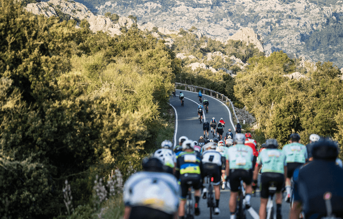 Cyclists climbing the Serra de Tramuntana mountain roads during Mallorca 312