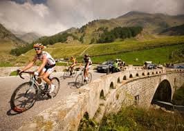 Cyclists ascending the Timmelsjoch pass high in the Austrian Alps during the Ötztaler Radmarathon