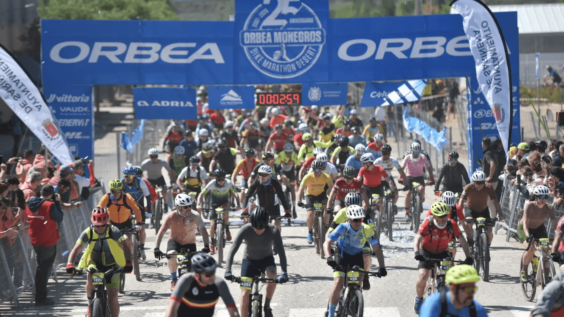 Mountain bikers riding through the dusty Monegros désert during the Orbea Monegros