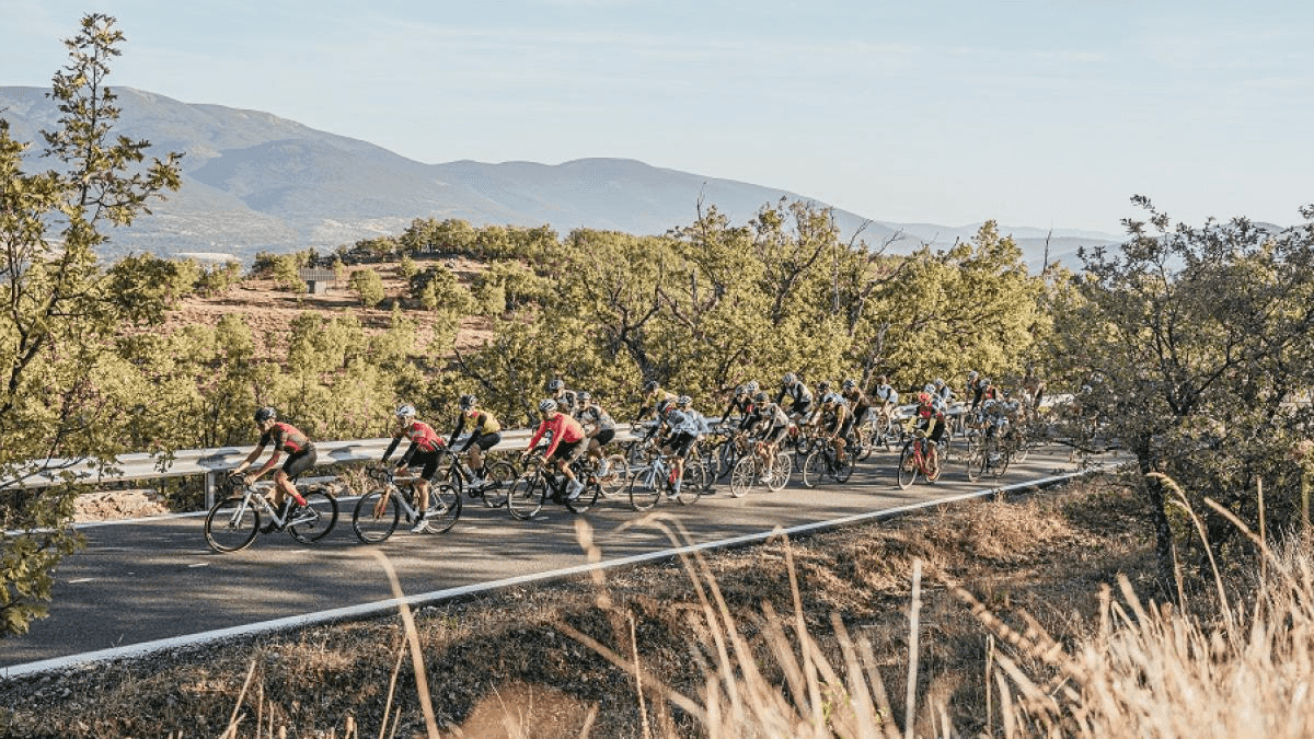 Peloton riding a mountain road in the Madrid sierra during Madrid 7 Picos