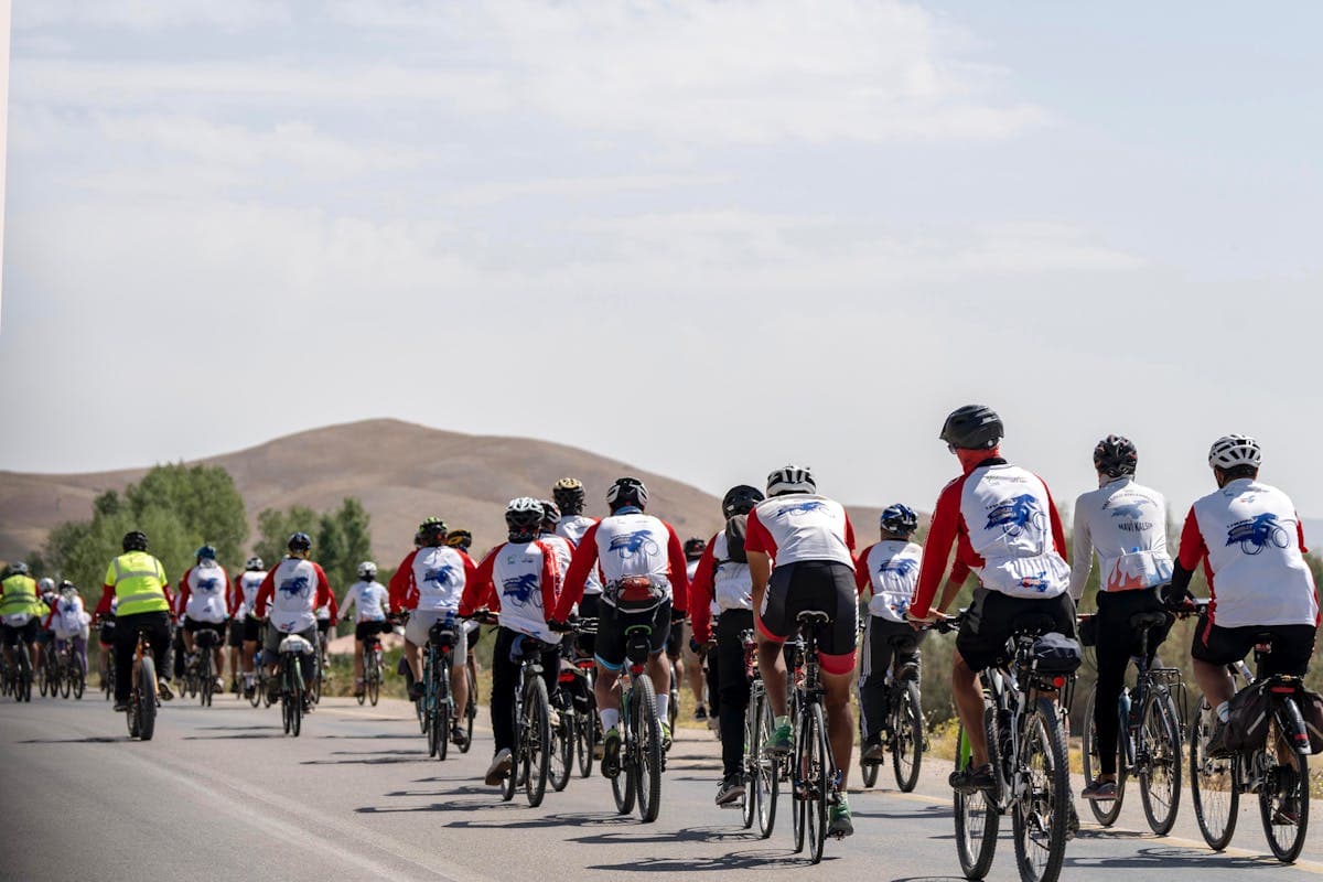 Road cyclists racing through the European-heritage valley of Santa Catarina during UCI Gran Fondo Brasil