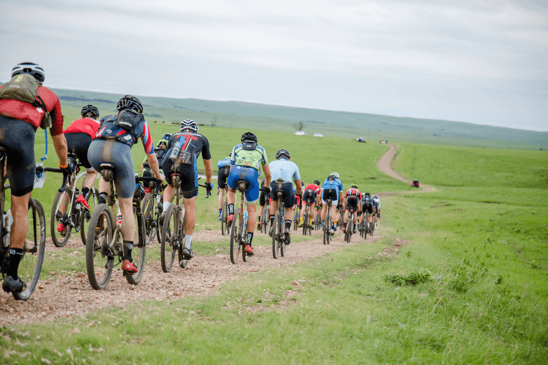 Gravel riders on the open Flint Hills roads during Unbound Gravel in Kansas
